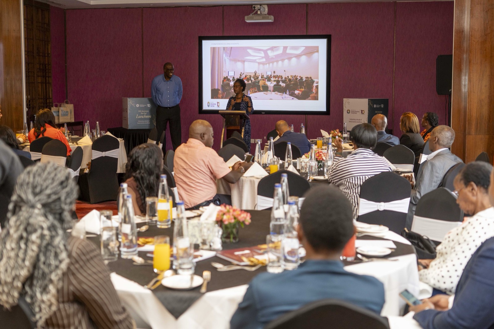 Joseph Okelo addressing members at the 10th anniversary luncheon