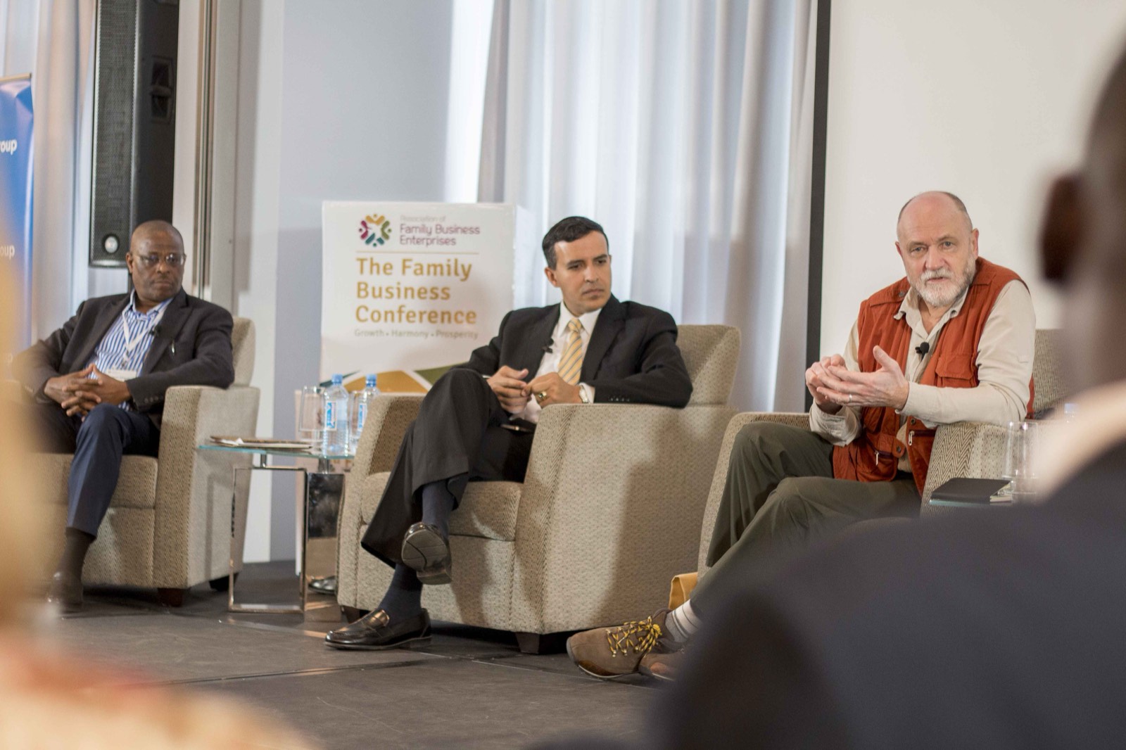 Panellists before a full room in 2015